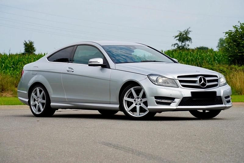 Silber Gebraucht 2013 Mercedes C220 AMG Coupé | 15.490 € (Teuer) - Bild 1/4