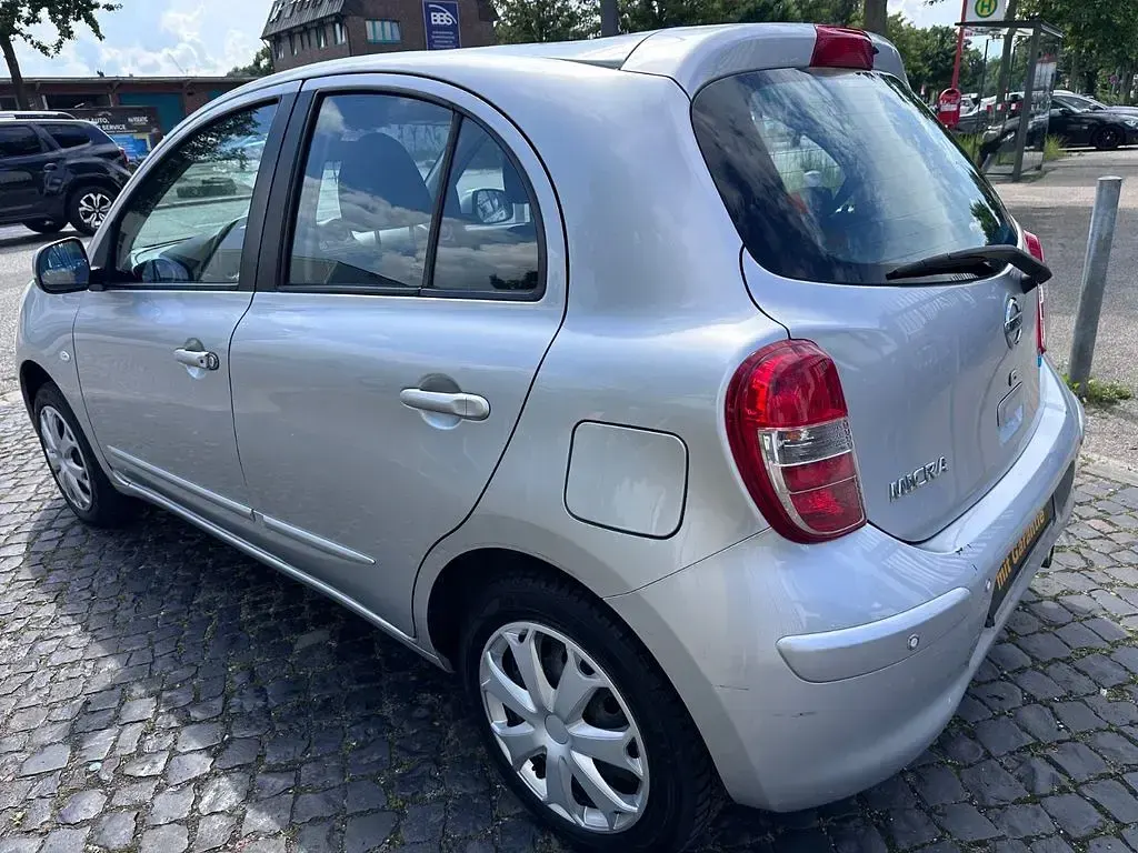 Gebraucht Nissan Micra Tekna 80 PS (58 kW) 2011 Silber Kleinwagen