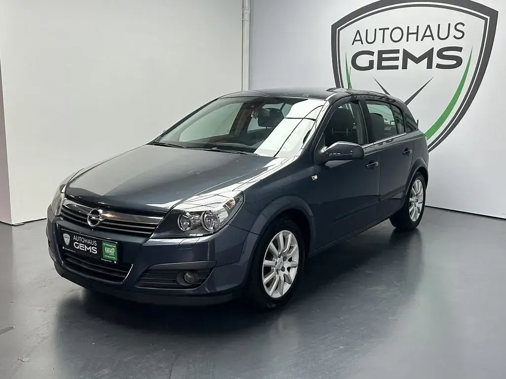 Używany Opel Astra Cosmo 101 KM (74 kW) 2006 Szary Sedan/Limuzyna