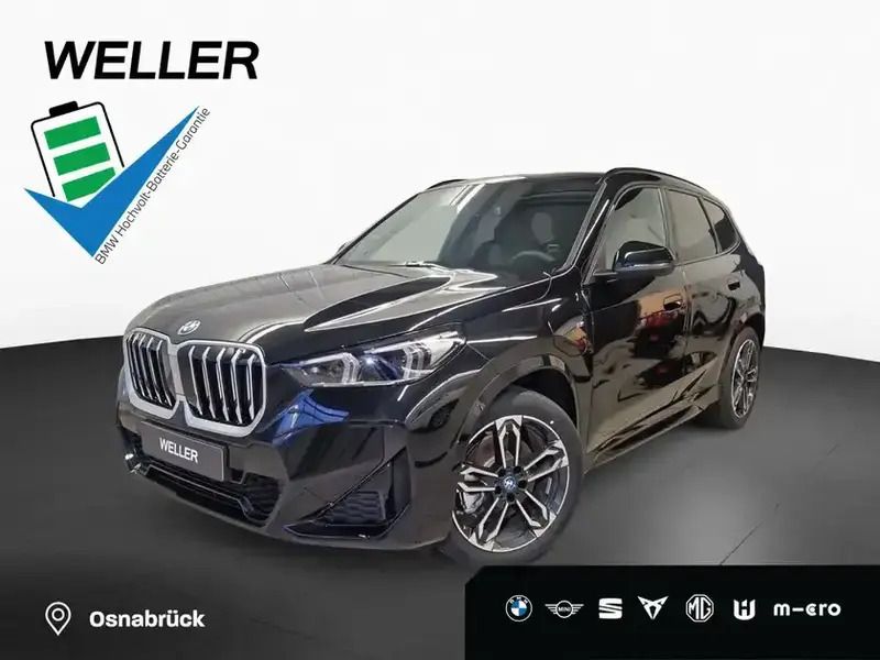 Saphirschwarz metallic (schwarz) Neu 2025 BMW X1 Comfort Edition SUV | 55.990 € (Fairer Preis) - Bild 1/4
