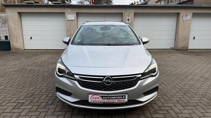 Grau Gebraucht 2016 Opel Astra Edition Kombi | 8.799 € (Guter Preis) - Bild 1/4