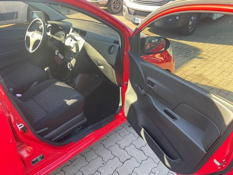 Gebraucht Daihatsu Cuore Plus 58 PS (42 kW) 2011 Rot Kleinwagen