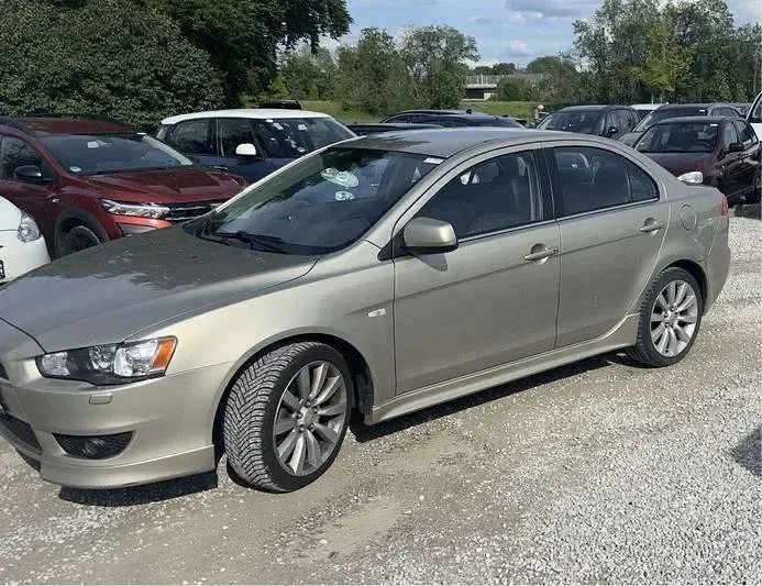 Gebraucht Mitsubishi Lancer 143 PS (105 kW) 2009 Gold Limousine