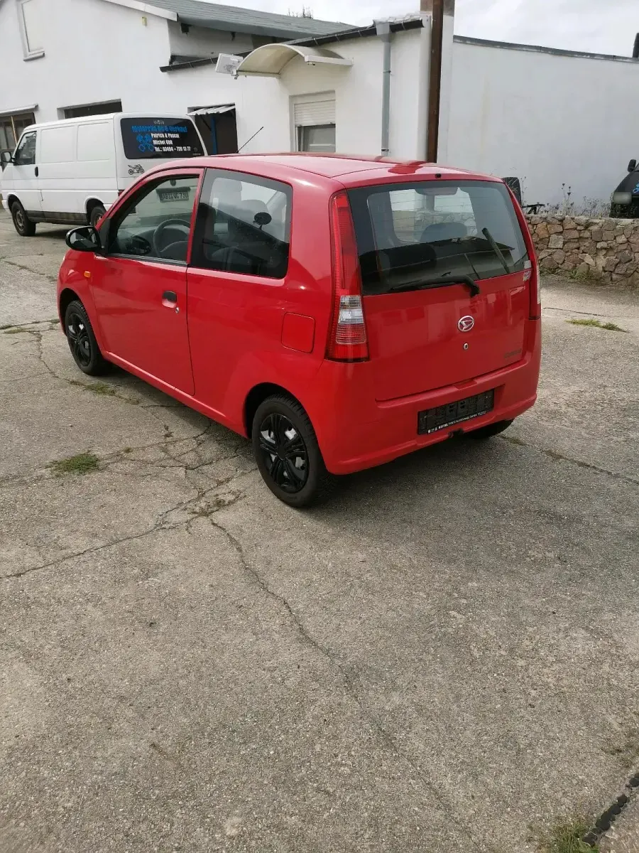 Gebraucht Daihatsu Cuore 58 PS (42 kW) 2004 Rot Kleinwagen