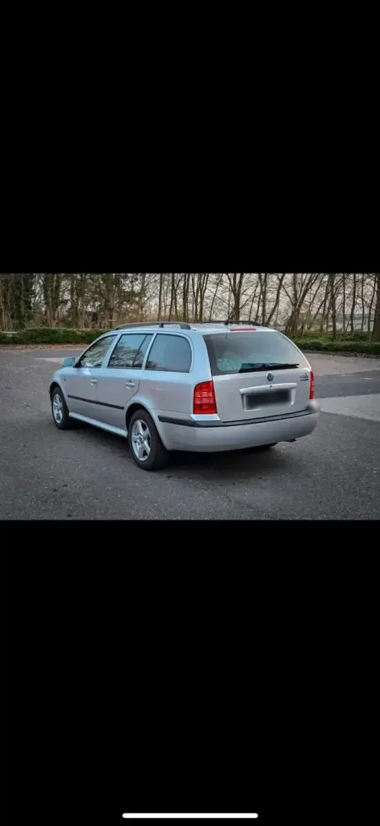 Używany Skoda Octavia 102 KM (75 kW) 2004 Srebrny Kombi