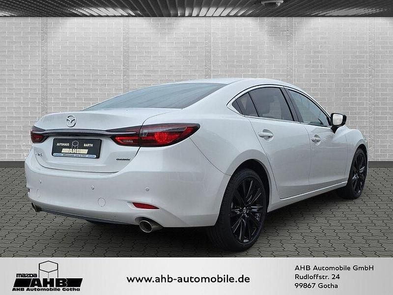 Gebraucht Mazda 6 Homura-Line 194 PS (142 kW) 2024 Rhodium white Kombi