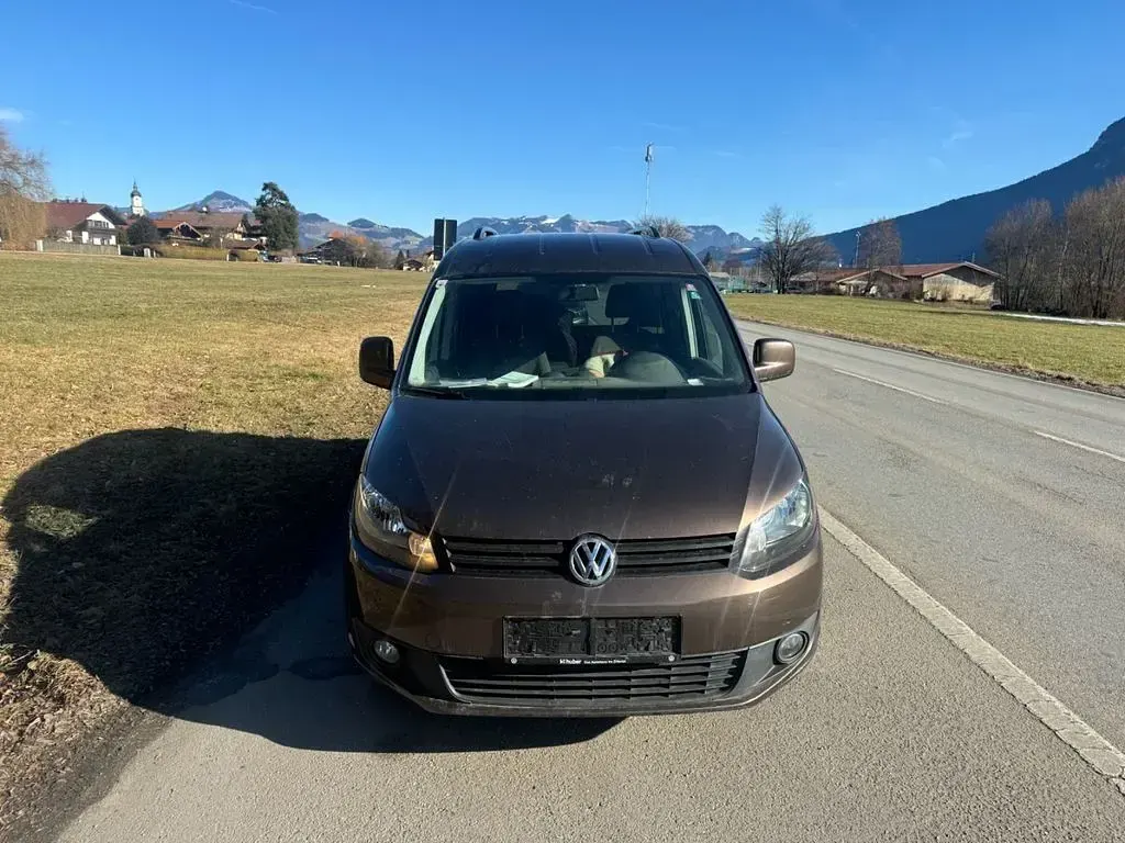 Używany VW Caddy 110 KM (80 kW) 2012 Brązowy Minivan