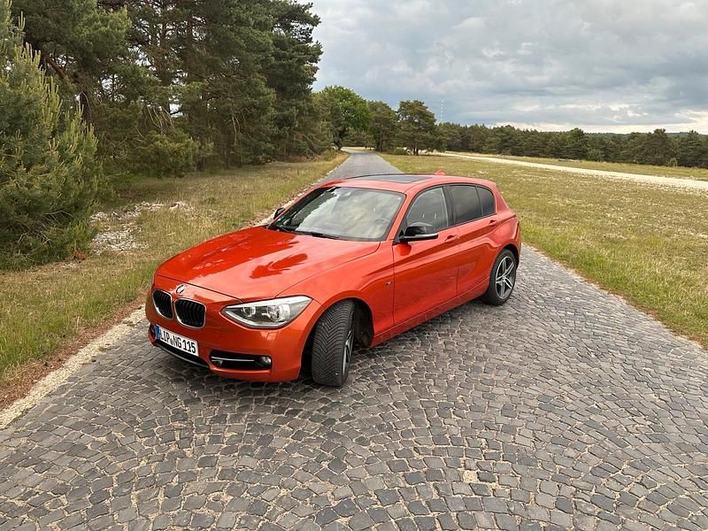 Orange Gebraucht 2012 BMW 120 Sport Line Kleinwagen | 8.900 € (Guter Preis) - Bild 1/4
