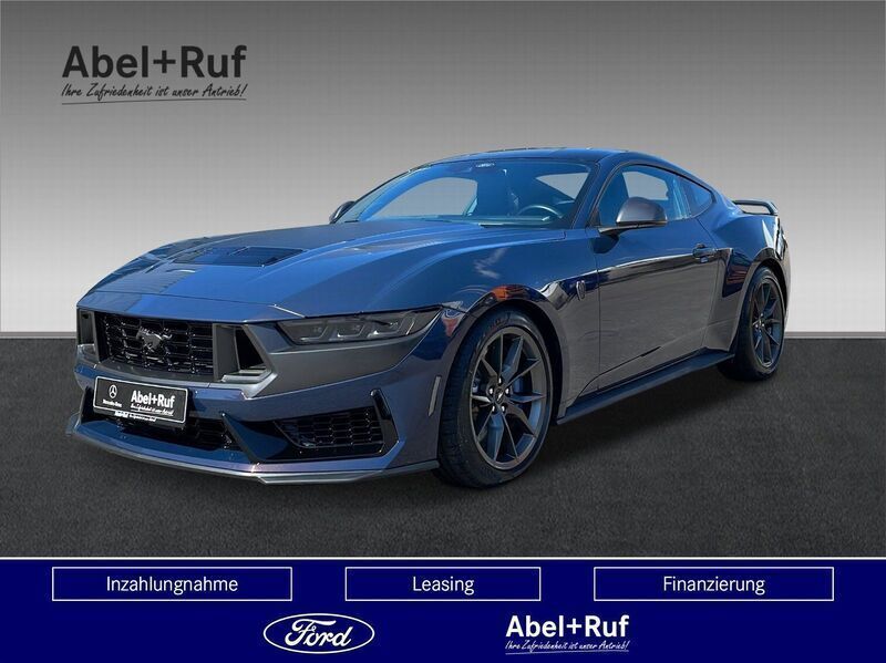 Dunkelblau (metallic) Gebraucht 2024 Ford Mustang Fastback Kleinwagen | 59.449 € - Bild 1/4