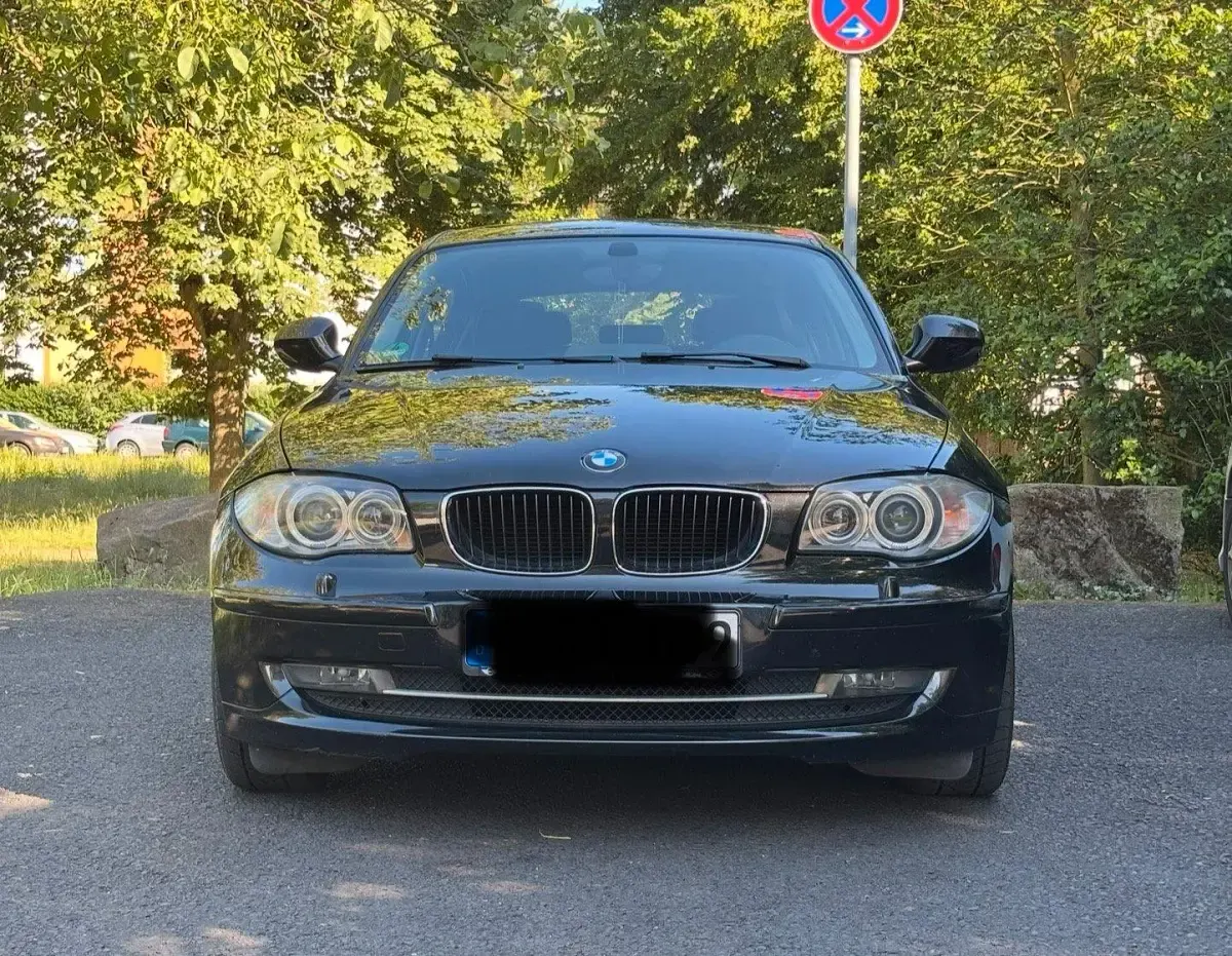Używany BMW 116 122 KM (89 kW) 2010 Czarny Hatchback