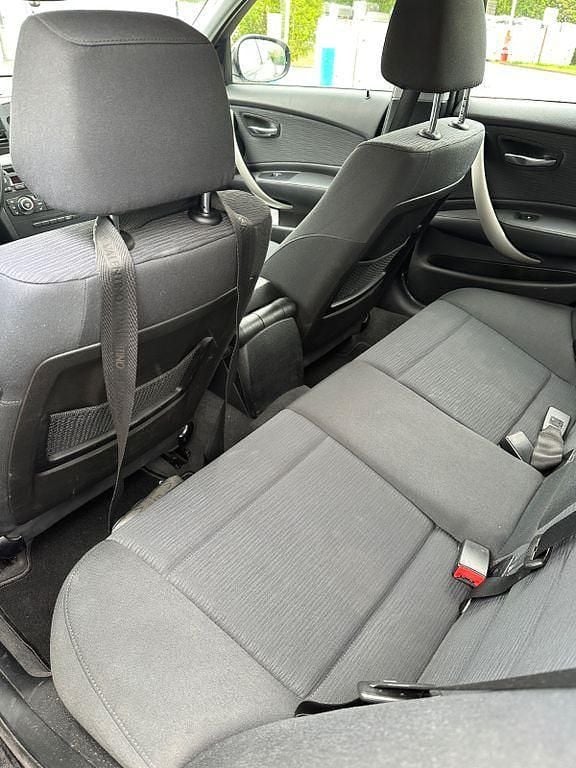 Gebraucht BMW 116 122 PS (89 kW) 2011 Schwarz Kleinwagen