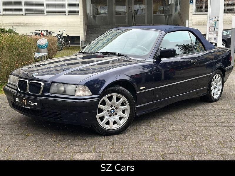 Blau Gebraucht 1999 BMW 320 Cabriolet Performance Cabrio | 7.399 € - Bild 1/4