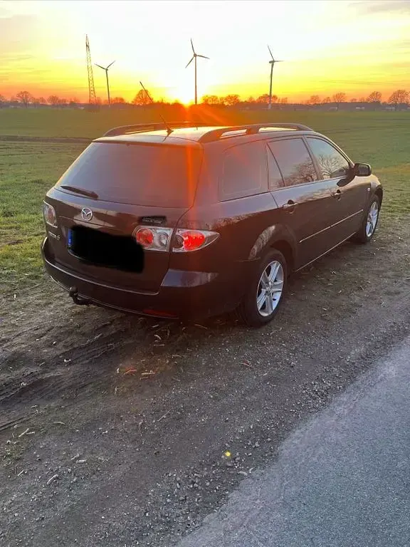 Używany Mazda 6 Exclusive 120 KM (88 kW) 2006 Purpurowy Kombi