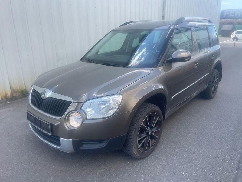 Braun Gebraucht 2013 Skoda Yeti Adventure SUV | 4.990 € - Bild 1/4