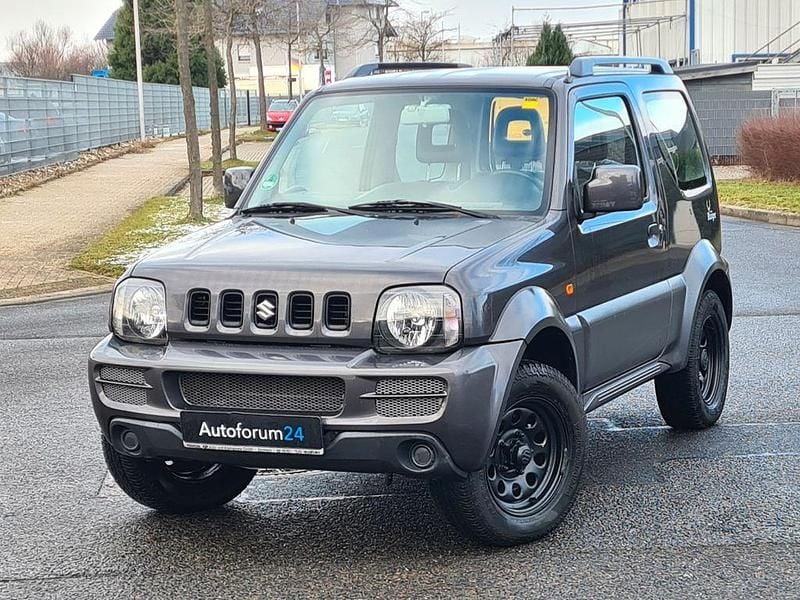 Grau Gebraucht 2012 Suzuki Jimny Comfort SUV | 9.999 € (Guter Preis) - Bild 1/4