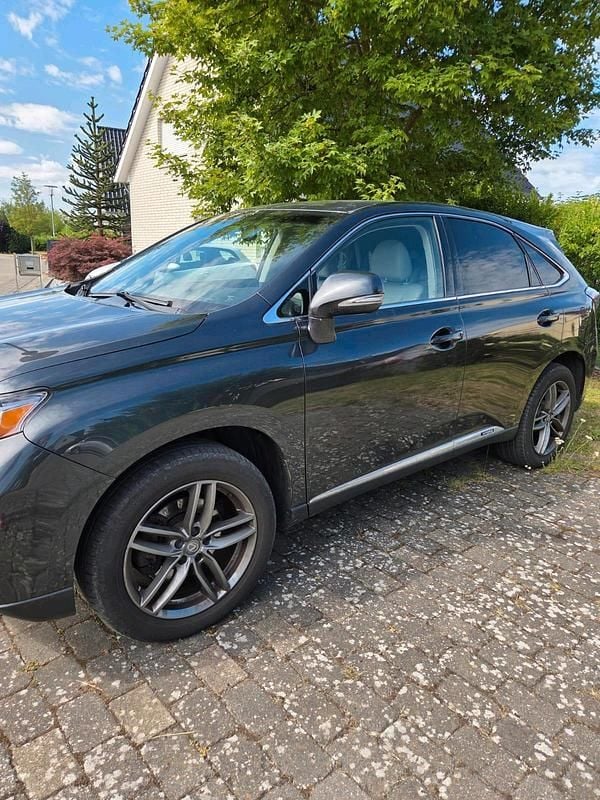Grau Gebraucht 2011 Lexus RX450h SUV | 15.500 € - Bild 1/4