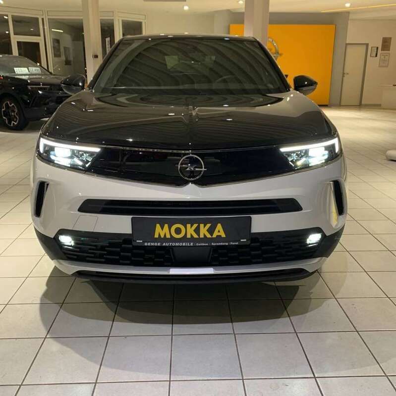 Gebraucht Opel Mokka-e Ultimate 100 kW (136 PS) 2023 Jade weiß (uni) SUV
