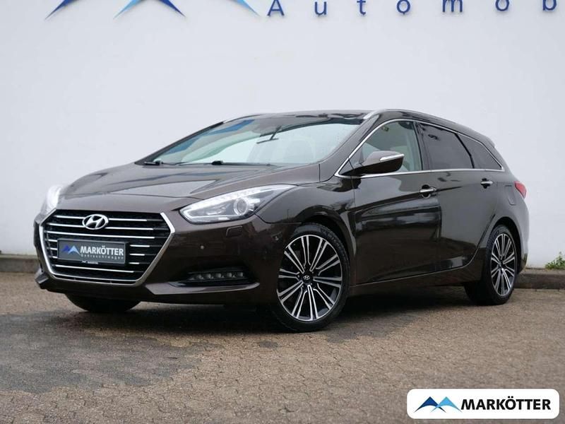 Tan brown / mic Gebraucht 2018 Hyundai i40 Premium Kombi | 13.490 € (Fairer Preis) - Bild 1/4