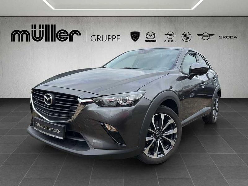 Matrixgrau metallic Gebraucht 2021 Mazda CX-3 Ad'Vantage SUV | 16.910 € (Guter Preis) - Bild 1/4