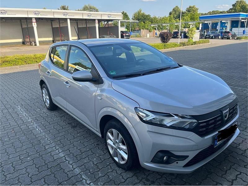 Grau Gebraucht 2022 Dacia Sandero Kleinwagen | 10.500 € (Superpreis) - Bild 1/4