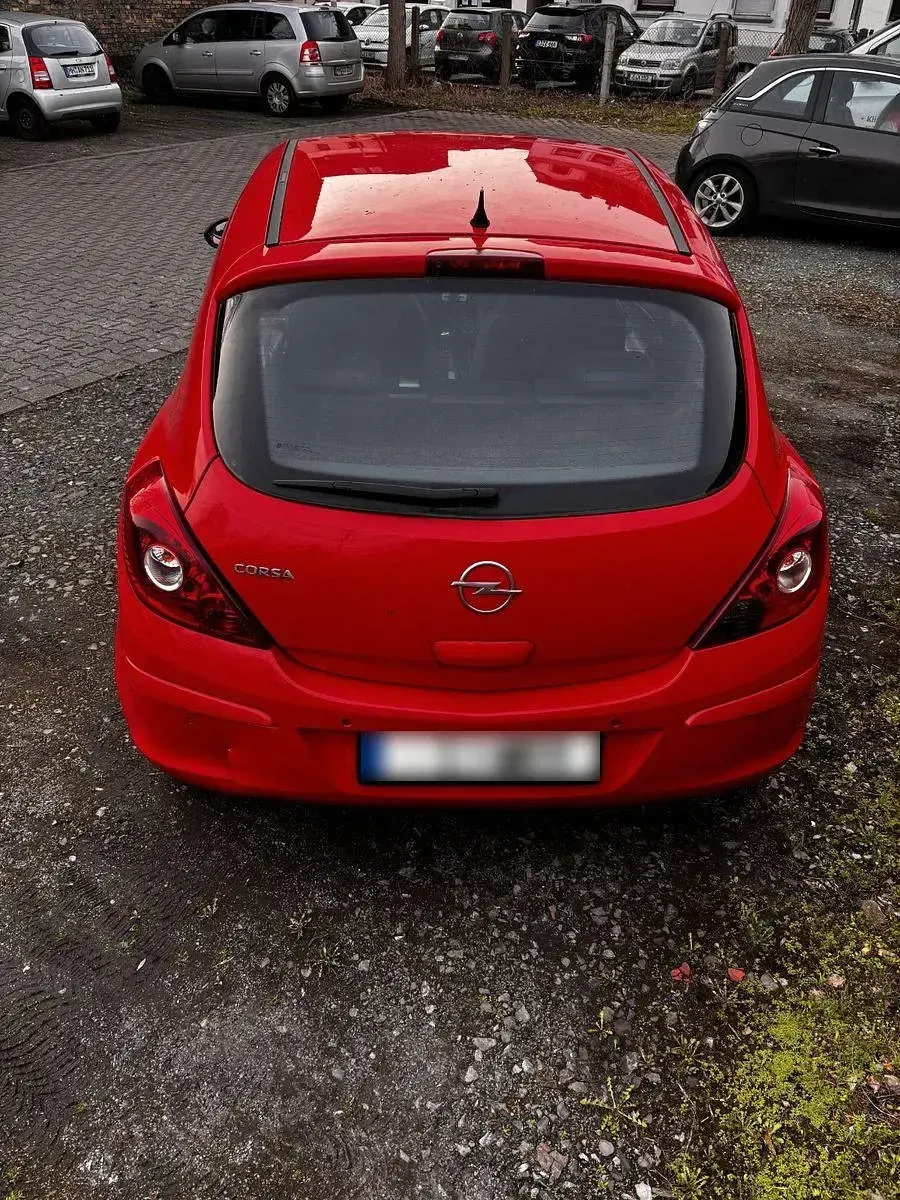 Usado Opel Corsa Innovation 80 HP (58 kW) 2009 Vermelho Citadino