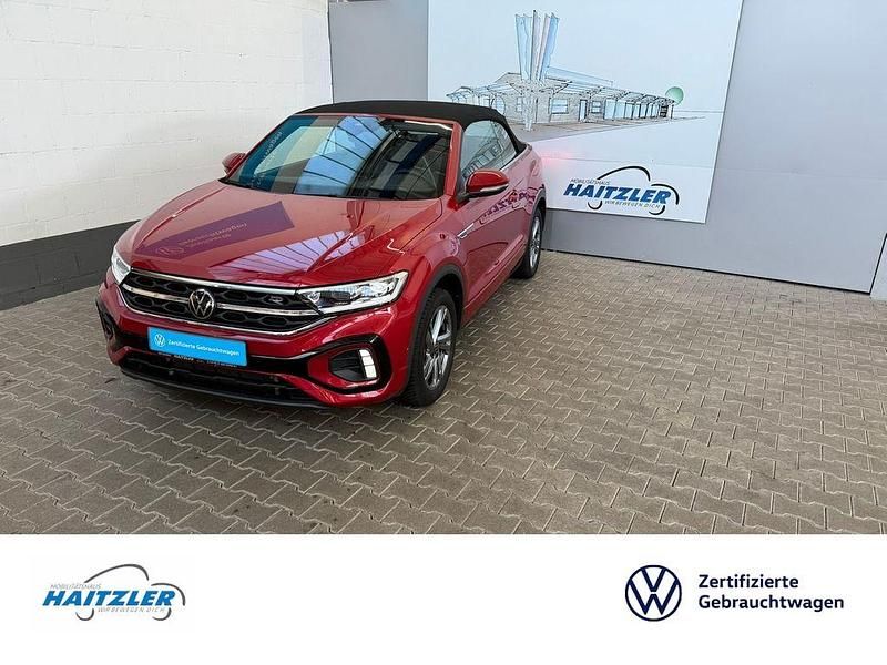 Kings red metallic (metallic) Gebraucht 2024 VW T-Roc Cabriolet R-line Cabrio | 35.750 € (Fairer Preis) - Bild 1/4