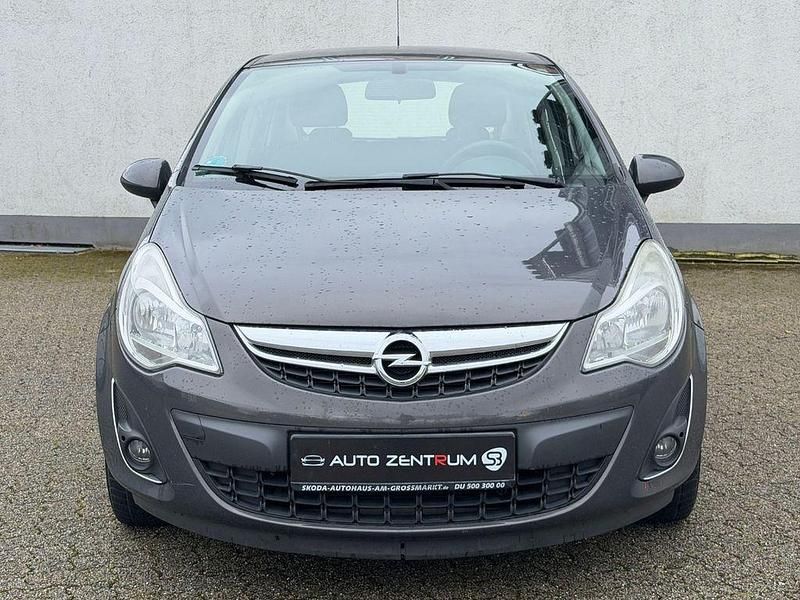 Grau Gebraucht 2013 Opel Corsa Active Limousine | 4.490 € (Guter Preis) - Bild 1/4