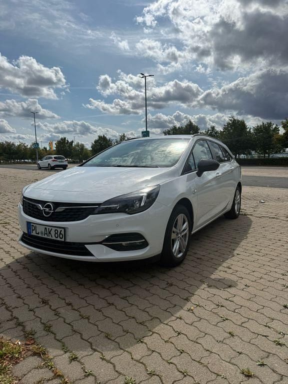 Weiß Gebraucht 2021 Opel Astra Edition Kombi | 15.990 € (Fairer Preis) - Bild 1/4