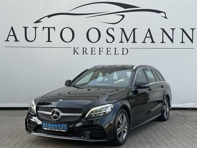 Schwarz unilack Gebraucht 2019 Mercedes C220 AMG line Kombi | 18.950 € (Fairer Preis) - Bild 1/4