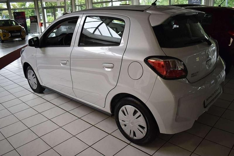 Neu Mitsubishi Space Star Plus 71 PS (52 kW) 2025 Titanweiß Limousine