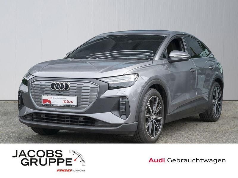 Taifungrau metallic Gebraucht 2022 Audi Q4 Sportback e-tron Ambiente SUV | 31.680 € (Superpreis) - Bild 1/4