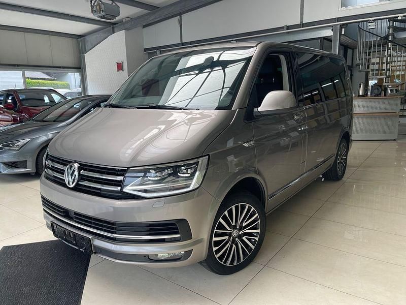 Beige Gebraucht 2019 VW Multivan Generation Six Van / Kleinbus | 25.799 € (Etwas zu teuer) - Bild 1/4