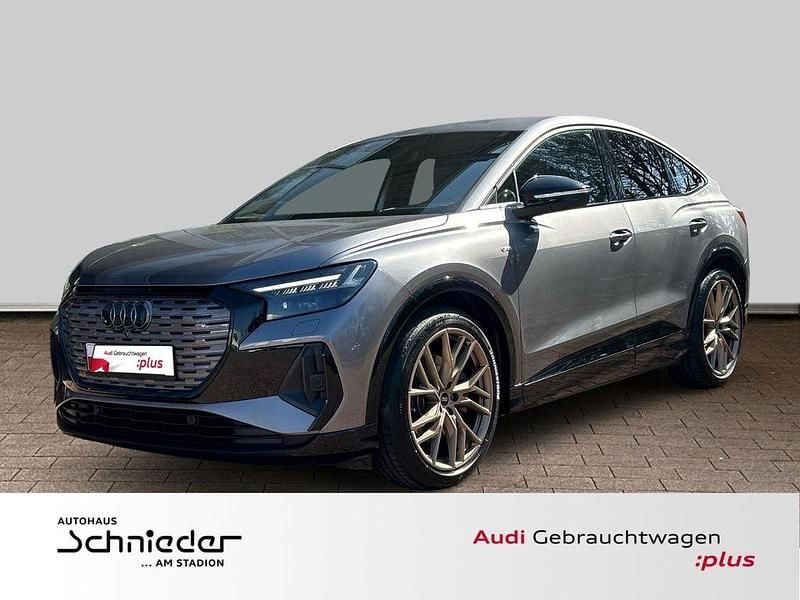 Grau Gebraucht 2021 Audi Q4 Sportback e-tron Sport SUV | 39.990 € (Etwas zu teuer) - Bild 1/4