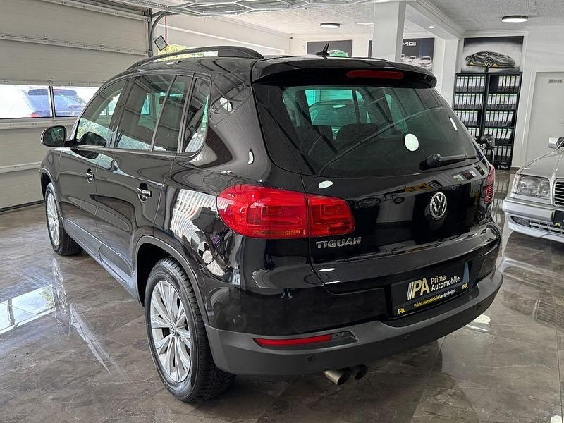 Second-hand VW Tiguan Trendline 122 CP (89 kW) 2012 Negru SUV