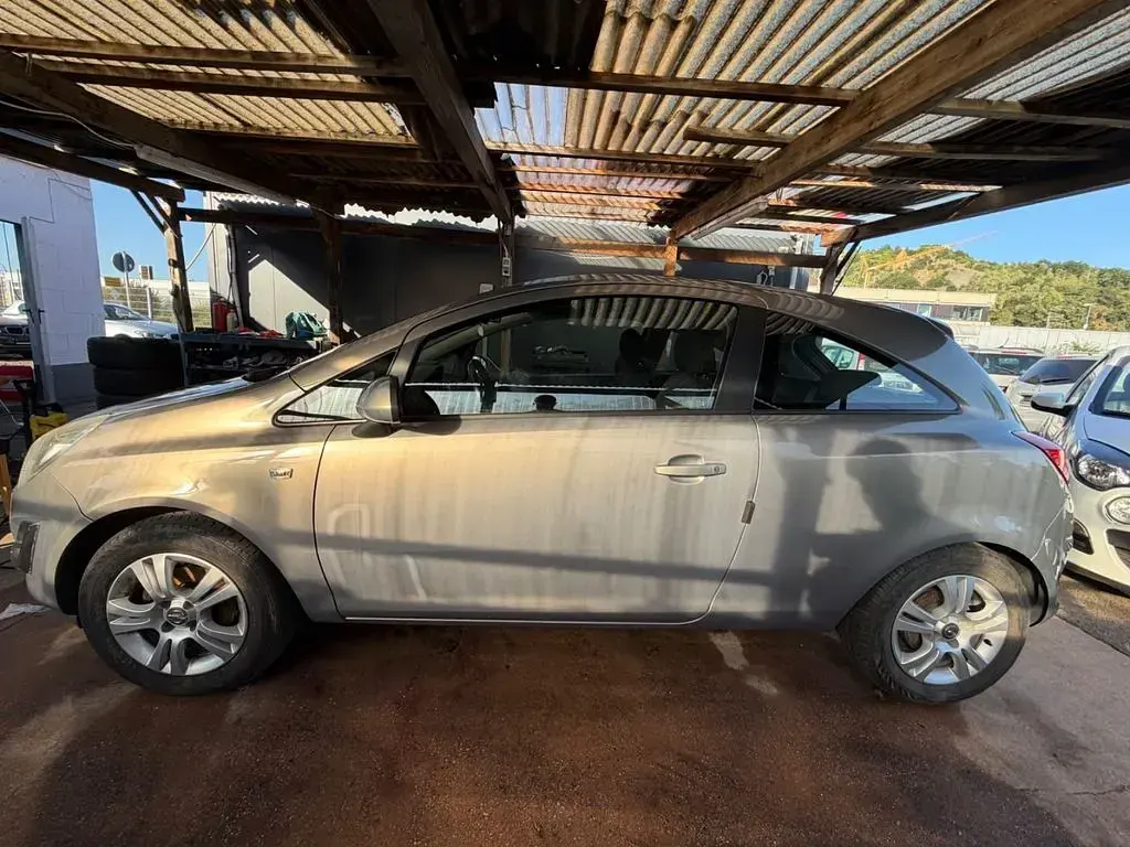 Gebraucht Opel Corsa Edition 95 PS (69 kW) 2012 Braun Kleinwagen