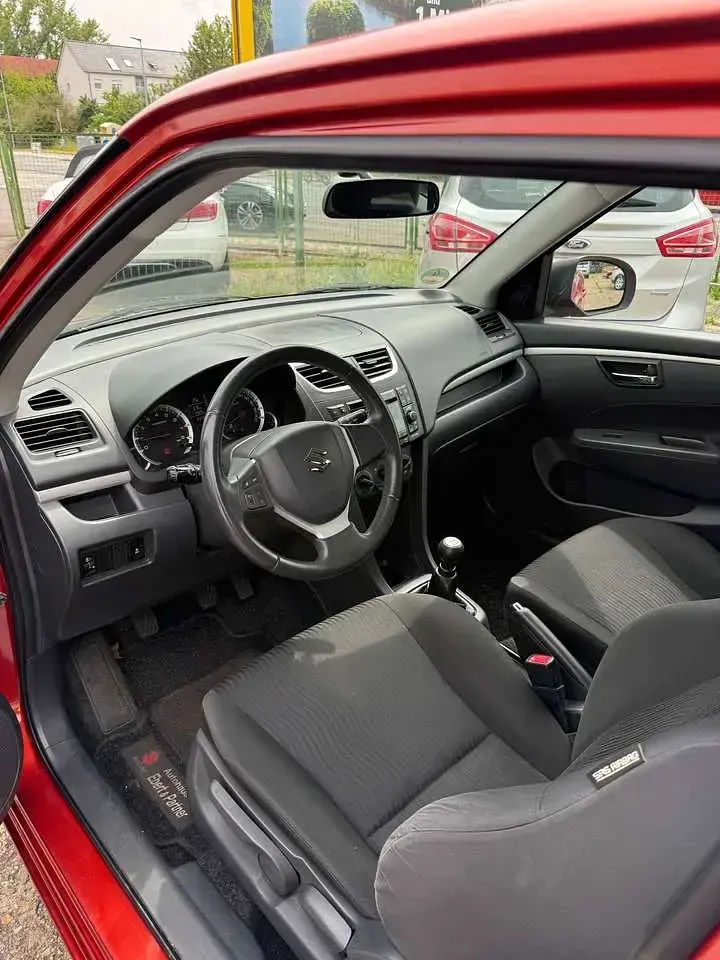 Gebraucht Suzuki Swift 94 PS (69 kW) 2014 Orange Kleinwagen