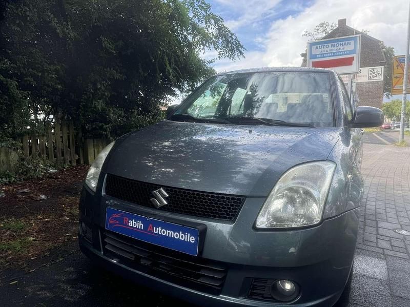Grau Gebraucht 2008 Suzuki Swift Comfort Limousine | 3.550 € (Fairer Preis) - Bild 1/4