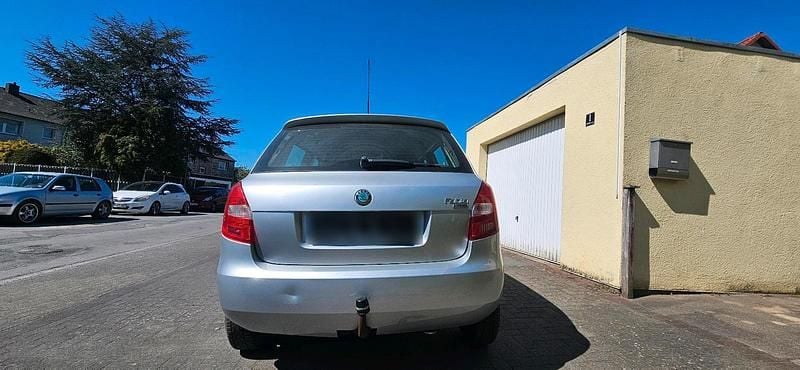 Second-hand Skoda Fabia 60 CP (44 kW) 2011 Argintiu Berlinǎ