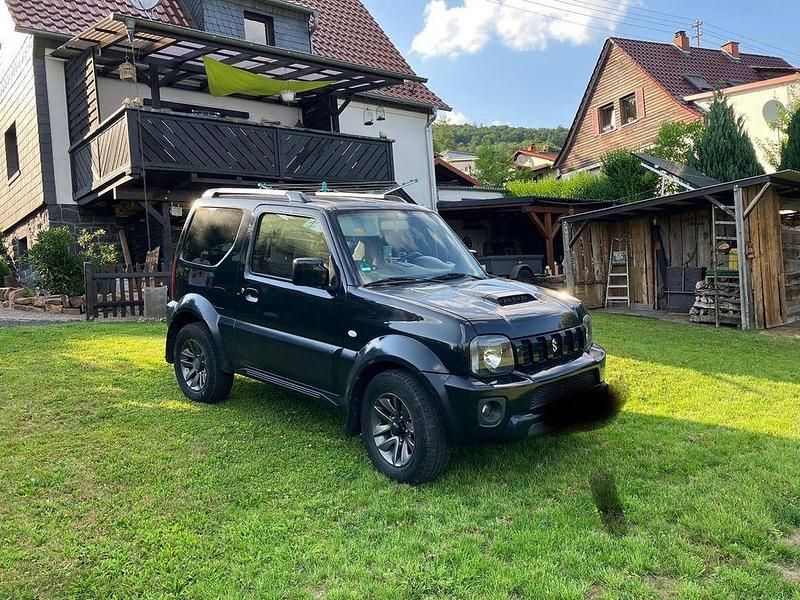 Schwarz Gebraucht 2015 Suzuki Jimny Style SUV | 11.450 € (Guter Preis) - Bild 1/4