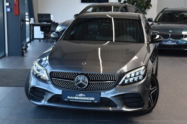 Grau Gebraucht 2020 Mercedes C300e AMG line Limousine | 24.950 € (Teuer) - Bild 1/2