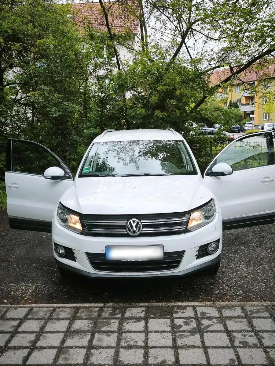 Second-hand VW Tiguan Cup 177 CP (130 kW) 2014 Alb SUV