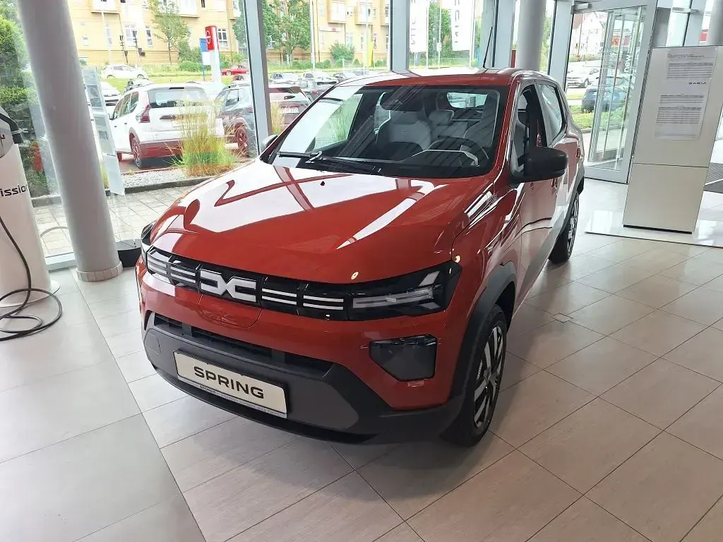 Neu Dacia Spring Expression 52 kW (71 PS) 2026 Brick red Kleinwagen