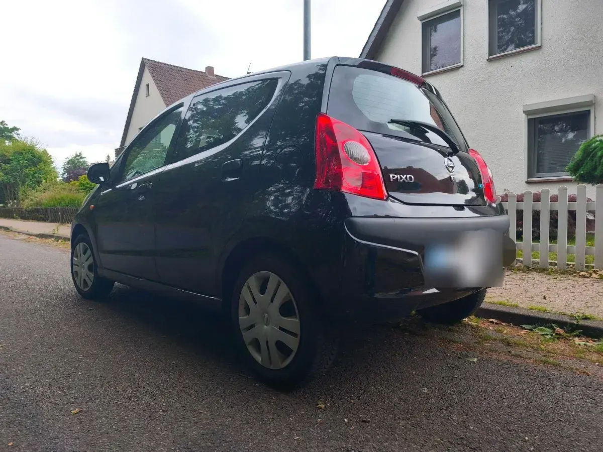 Gebraucht Nissan Pixo Acenta 68 PS (50 kW) 2009 Schwarz Kleinwagen