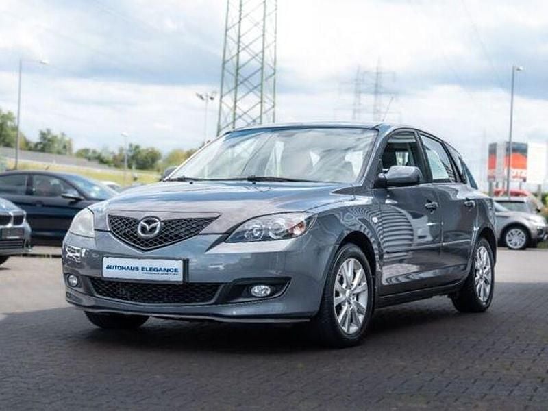 Mephistograu metallic Gebraucht 2007 Mazda 3 Active Kleinwagen | 2.680 € (Guter Preis) - Bild 1/4