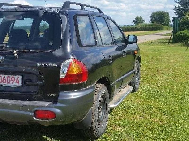 Gebraucht Hyundai Santa Fe GLS 145 PS (106 kW) 2002 Ebony black+cool gra SUV