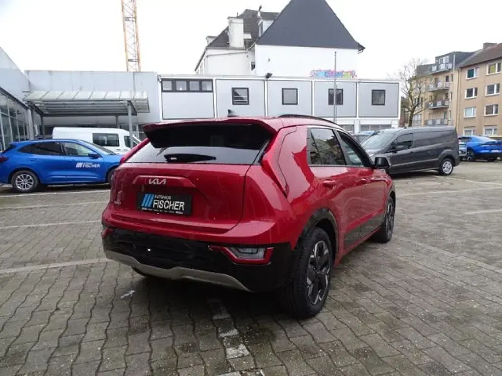 Gebraucht Kia e-Niro Inspiration 150 kW (204 PS) 2024 (cr5) runway rot met. SUV