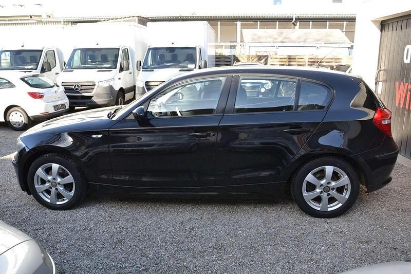 Second-hand BMW 116 122 CP (89 kW) 2008 Negru Hatchback