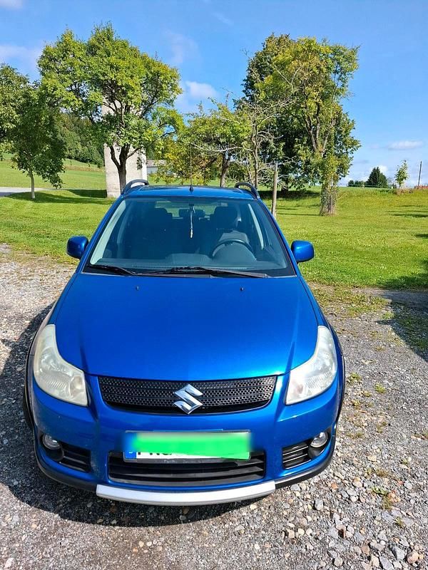 Blau Gebraucht 2009 Suzuki SX4 SUV | 3.600 € (Fairer Preis) - Bild 1/4