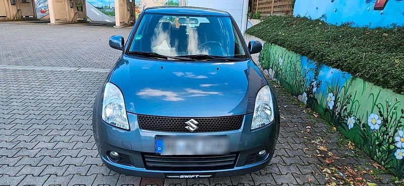 Grau Gebraucht 2007 Suzuki Swift Kleinwagen | 2.900 € (Etwas zu teuer) - Bild 1/4
