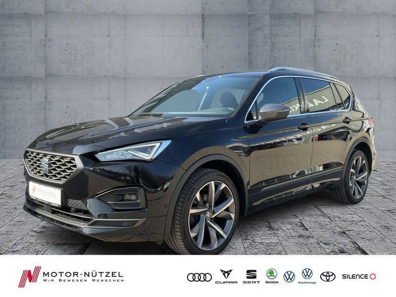 "deep" schwarz perleffekt Gebraucht 2022 Seat Tarraco FR-Line SUV | 31.360 € (Fairer Preis) - Bild 1/4